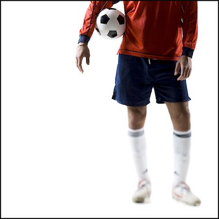 simsearch:640-03256208,k - Aine de soccer player holding Photographie de stock - Premium Libres de Droits, Code: 640-03264988