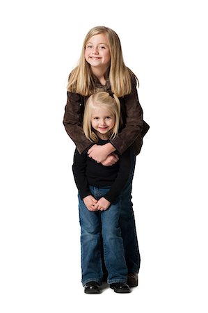 shoulder ride - Young sisters posing Stock Photo - Premium Royalty-Free, Code: 640-03265099