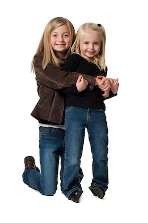 riding on shoulders - Young sisters posing Stock Photo - Premium Royalty-Free, Code: 640-03265100
