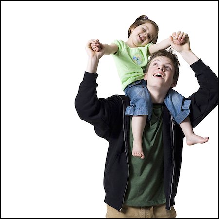 piggyback brothers - Brother and younger sister Stock Photo - Premium Royalty-Free, Code: 640-03265313