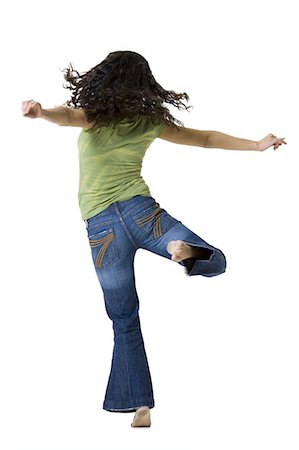 simsearch:640-03265333,k - Woman dancing and shaking her hair Stock Photo - Premium Royalty-Free, Code: 640-03265327