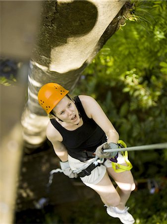 summer vacation - Female tree climber Stock Photo - Premium Royalty-Free, Code: 640-03265710