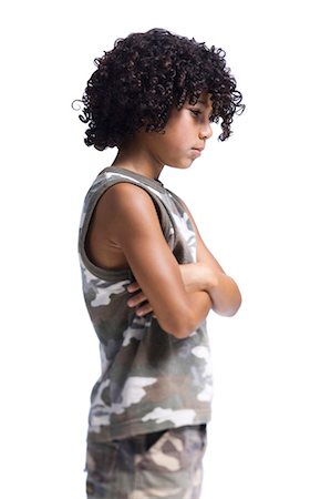 Boy standing with arms crossed Stock Photo - Premium Royalty-Free, Code: 640-03260002