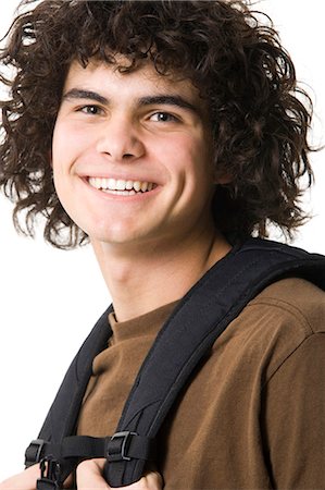 simsearch:640-03260747,k - Teenage boy smiling with backpack Stock Photo - Premium Royalty-Free, Code: 640-03260749