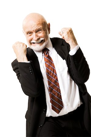 Businessman with clenched fists Stock Photo - Premium Royalty-Free, Code: 640-03260859