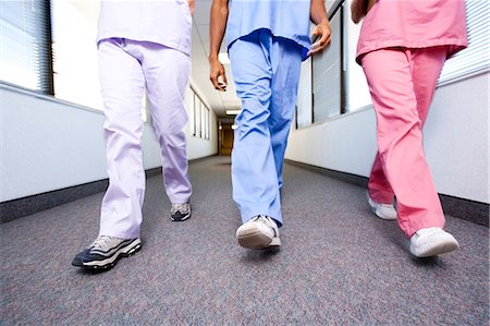 doctor nurse walking - Nurses walking and talking Stock Photo - Premium Royalty-Free, Code: 640-03261692