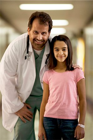 Portrait of a male doctor and girl Stock Photo - Premium Royalty-Free, Code: 640-03261977