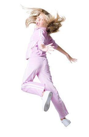 preteen girls flexible - Portrait of a girl leaping Stock Photo - Premium Royalty-Free, Code: 640-03262064