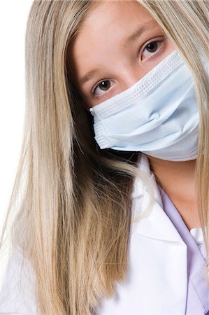 surgical mask - Closeup of girl with surgical mask Stock Photo - Premium Royalty-Free, Code: 640-03262323