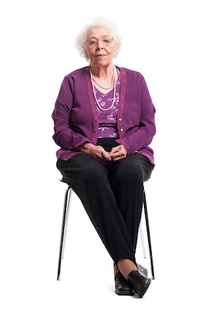 Older Woman sitting and smiling Stock Photo - Premium Royalty-Free, Code: 640-03262546