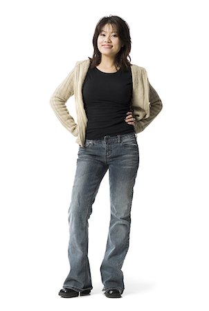 full - Femme pleine longueur qui pose en bleu jeans Photographie de stock - Premium Libres de Droits, Code: 640-03263109