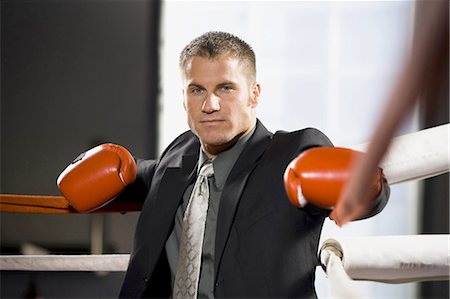 Businessman boxing Stock Photo - Premium Royalty-Free, Code: 640-03263499
