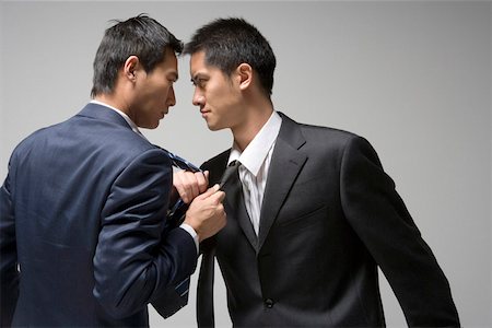 Two fighting business man Stock Photo - Premium Royalty-Free, Code: 642-01736442