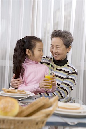 simsearch:642-02005954,k - a girl and her grandma taking breakfast Stock Photo - Premium Royalty-Free, Code: 642-02005944