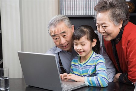 simsearch:642-02005954,k - a girl and her grandpa and grandma playing the computer Stock Photo - Premium Royalty-Free, Code: 642-02006189