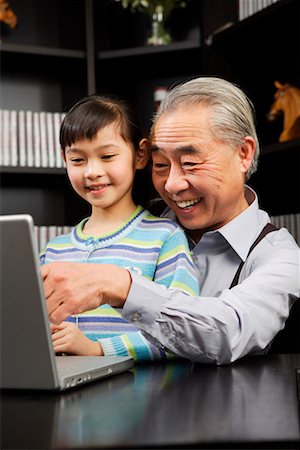 simsearch:642-02005954,k - a girl and her grandpa playing the computer Stock Photo - Premium Royalty-Free, Code: 642-02006198