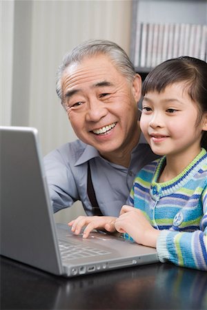 simsearch:642-02005954,k - a girl and her grandpa playing the computer Stock Photo - Premium Royalty-Free, Code: 642-02006190