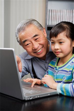 simsearch:642-02005954,k - a girl and her grandpa playing the computer Stock Photo - Premium Royalty-Free, Code: 642-02006200