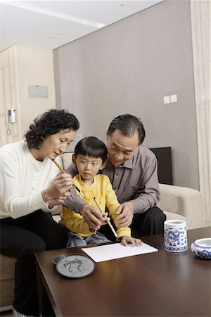 simsearch:642-02005954,k - a boy and his grandpa and grandma writing with Chinese inkbrushes Stock Photo - Premium Royalty-Free, Code: 642-02006272