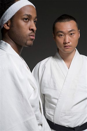 two Chinese Kungfu practicians Stock Photo - Premium Royalty-Free, Code: 642-02006397