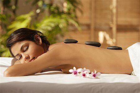 plumeria - A woman relaxes at a spa Stock Photo - Premium Royalty-Free, Code: 655-01781324