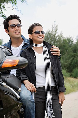simsearch:614-06896253,k - Young couple with motorbike Stock Photo - Premium Royalty-Free, Code: 655-01781532