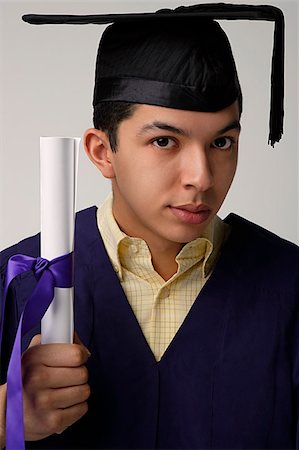 Portrait of graduate with diploma Stock Photo - Premium Royalty-Free, Code: 655-02375823