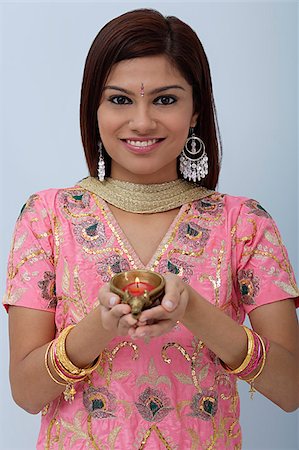 singapore traditional clothing - Young woman dressed in traditional Indian clothing (salwar kameez) Stock Photo - Premium Royalty-Free, Code: 655-02375867