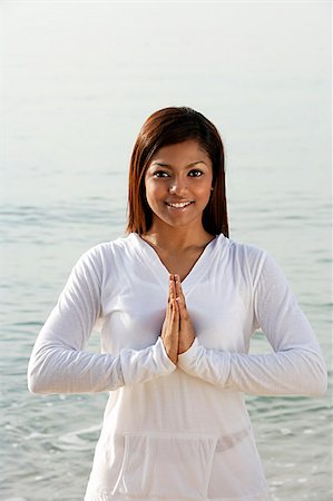 woman practicing yoga at the beach Stock Photo - Premium Royalty-Free, Code: 655-02702898