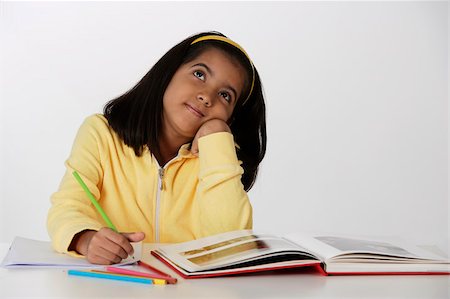 pencil crayon - Girl working with color pencils and book Foto de stock - Sin royalties Premium, Código: 655-02883024