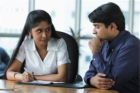 simsearch:655-03458001,k - Indian woman and man discussing work Stock Photo - Premium Royalty-Free, Code: 655-03458011