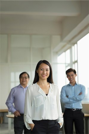 simsearch:656-03241003,k - Singapore, Three business people in office Stock Photo - Premium Royalty-Free, Code: 656-08349914