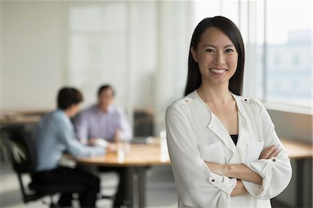simsearch:656-03241003,k - Singapore, Three business people in office Stock Photo - Premium Royalty-Free, Code: 656-08349915