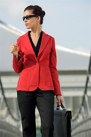 Businesswoman looking into distance Stock Photo - Premium Royalty-Free, Code: 656-01766908