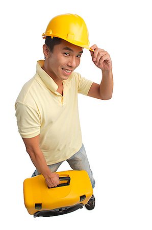 plumber - Builder with tool box smiling at camera Stock Photo - Premium Royalty-Free, Code: 656-01766982