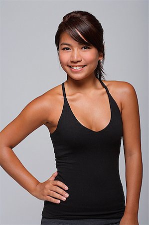 simsearch:858-03050428,k - Young woman smiling at camera Stock Photo - Premium Royalty-Free, Code: 656-01767074