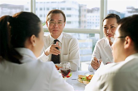 simsearch:655-03458001,k - Executives meeting over lunch Stock Photo - Premium Royalty-Free, Code: 656-01767693