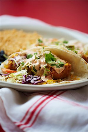 simsearch:659-06372915,k - Mexican Plate of Fish Tacos with Beans and Rice Stock Photo - Premium Royalty-Free, Code: 659-06154236