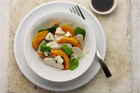 simsearch:600-06382994,k - Fried butternut squash, poached chicken, spinach and feta salad Stock Photo - Premium Royalty-Free, Code: 659-06154399