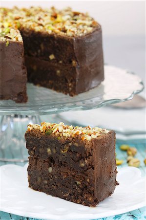 pistachio - Chocolate brownie cake with nuts and pistachios, sliced Stock Photo - Premium Royalty-Free, Code: 659-06154768