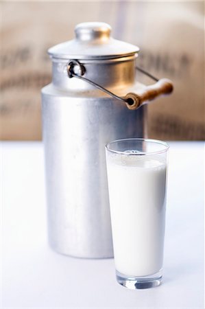 simsearch:659-07027183,k - A glass of milk in front of a milk can Stock Photo - Premium Royalty-Free, Code: 659-06154835