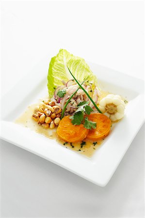 simsearch:659-06372915,k - Tilapia Ceviche with Andean Corn, Sweet Potato and Citrus Aji Amarillo Sauce Stock Photo - Premium Royalty-Free, Code: 659-06154974