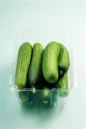 Cucumbers in a Plastic Container Stock Photo - Premium Royalty-Free, Code: 659-06155872