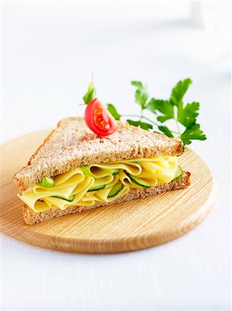 A cheese and gherkin sandwich on wholemeal bread Stock Photo - Premium Royalty-Free, Code: 659-06155937