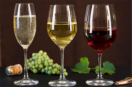 simsearch:659-06186663,k - A glass of champagne, a glass of white wine and a glass of red wine Stock Photo - Premium Royalty-Free, Code: 659-06155933