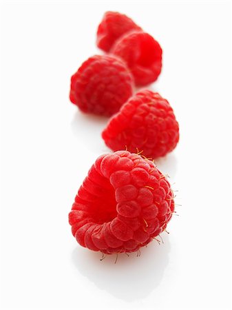 raspberry - Five raspberries Stock Photo - Premium Royalty-Free, Code: 659-06152129