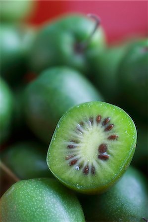 Mini kiwis (actinidia arguta) Stock Photo - Premium Royalty-Free, Code: 659-06152425