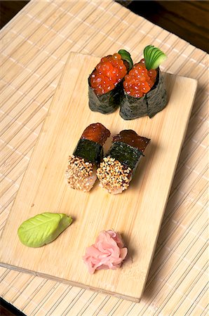 simsearch:659-07610354,k - Sushi with mackerel and salmon caviar on a wooden board Stock Photo - Premium Royalty-Free, Code: 659-06153096