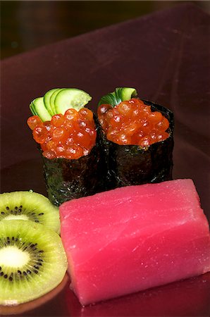simsearch:659-07610354,k - Tuna sashimi, kiwis and maki with salmon caviar Stock Photo - Premium Royalty-Free, Code: 659-06153105