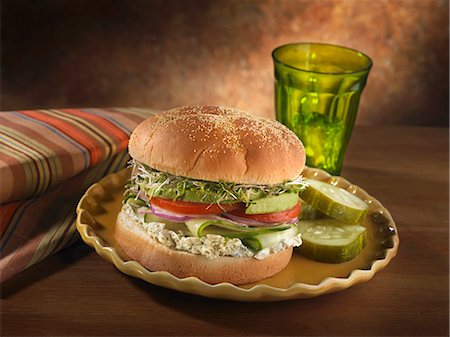 Veggie Sandwich with Cream Cheese Pesto Spread; Pickles Stock Photo - Premium Royalty-Free, Code: 659-06153158